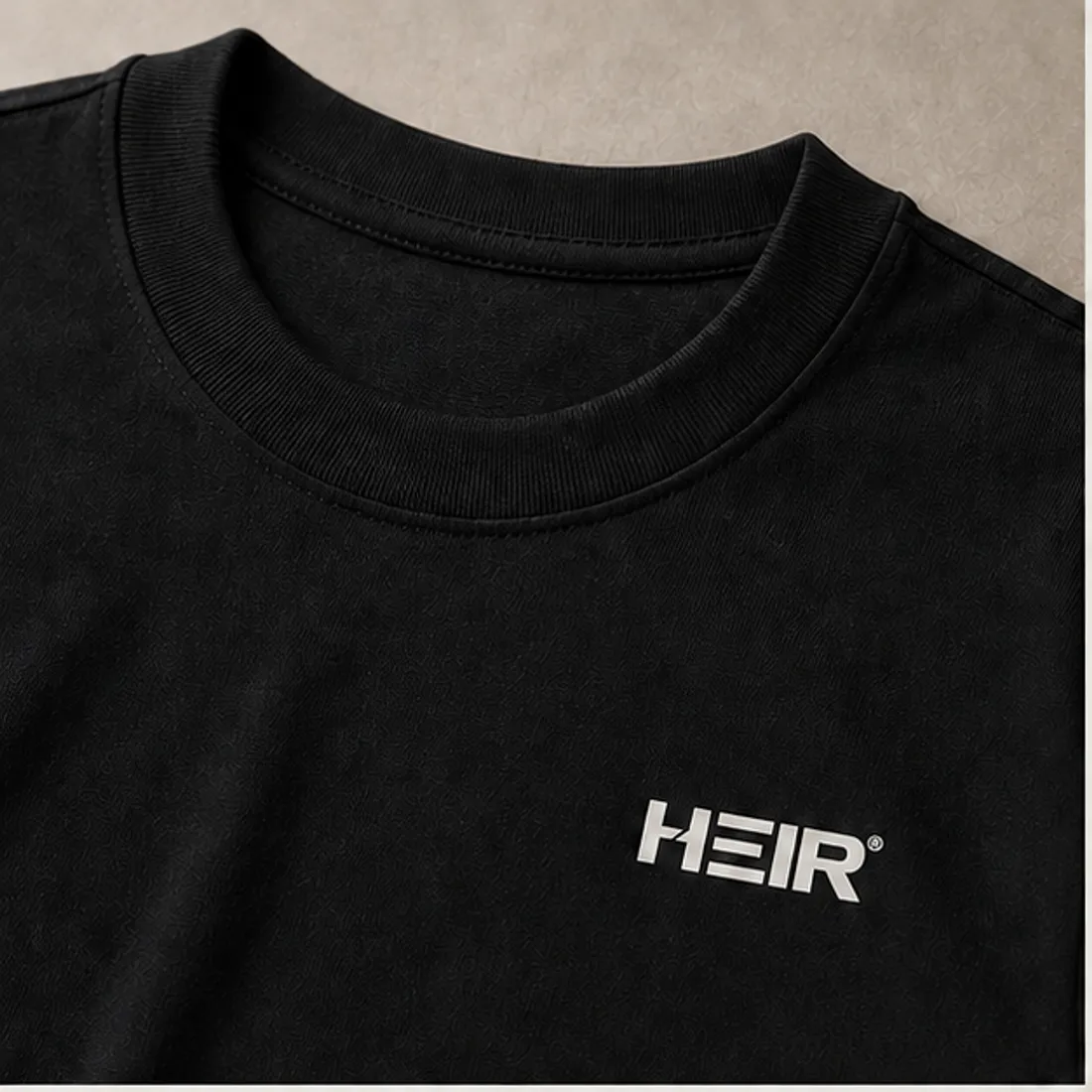 Collar detail with the HEIR wordmark